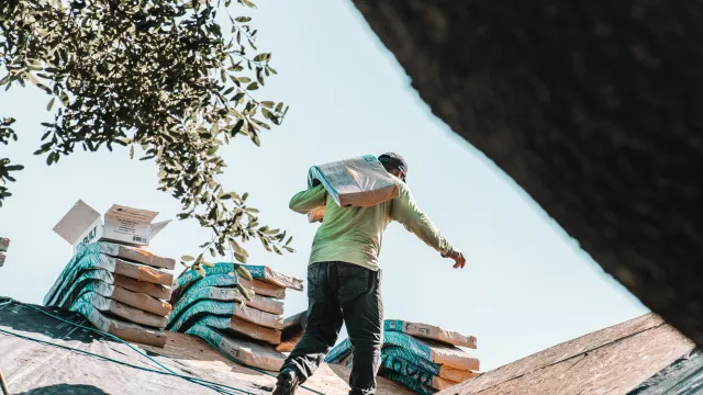 a person walking on a roof