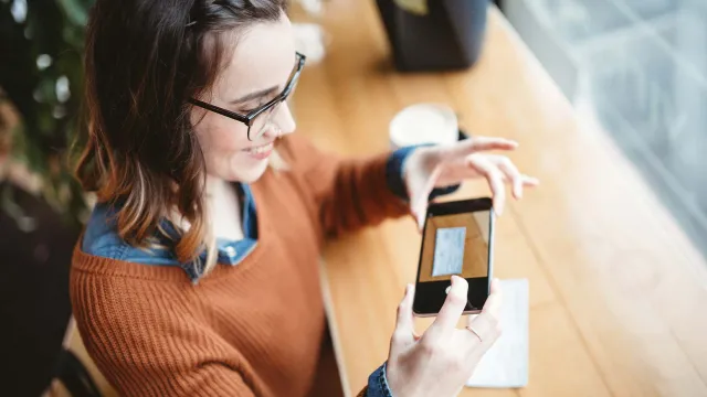 a woman using a cell phone