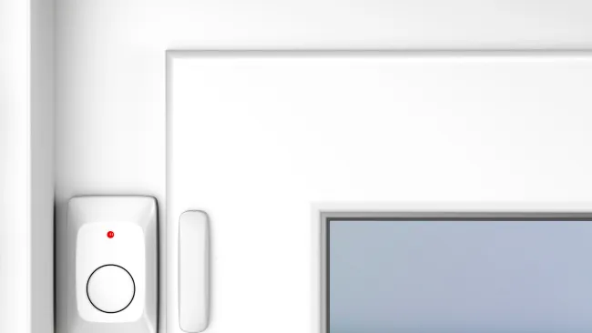 a white wall with a white door