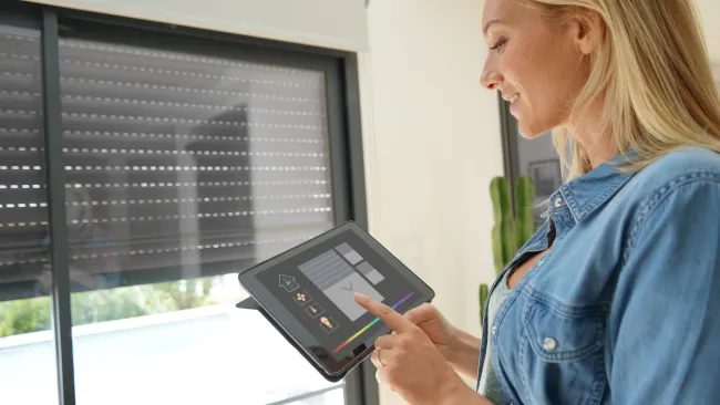 a person holding a tablet