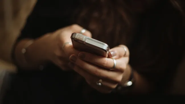 a person holding a cell phone