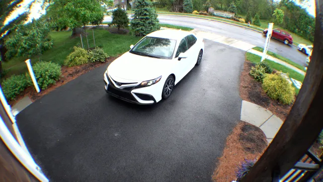 a white car parked on a street