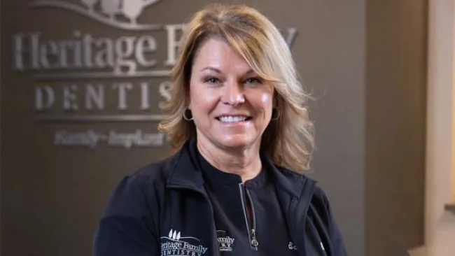 a person smiling for the camera