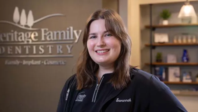 a person smiling for the camera