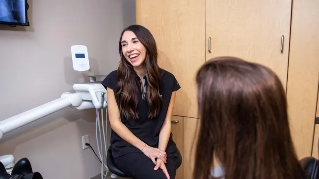 a woman sitting in a chair