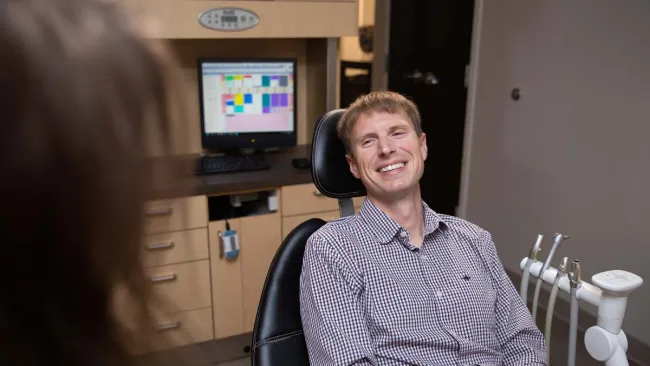 a person sitting in a chair