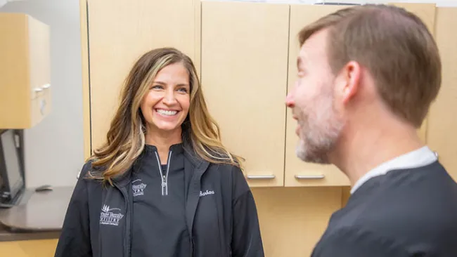 a man and a woman talking