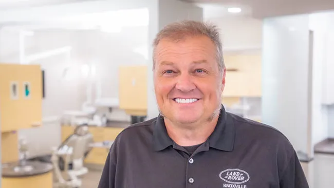 a man smiling for the camera