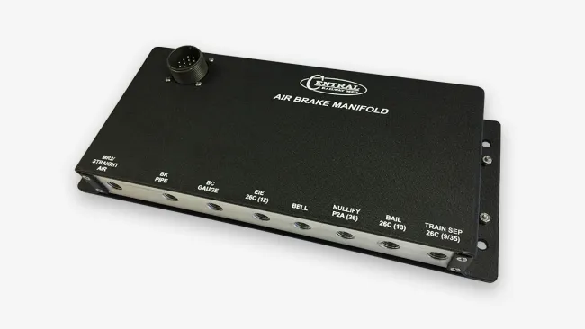 Black Central Air Brake Manifold with multiple labeled ports and a circular connector on a white background