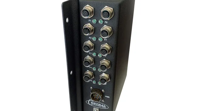 Black industrial electronic device with multiple circular metal connectors and LED indicators on a white background