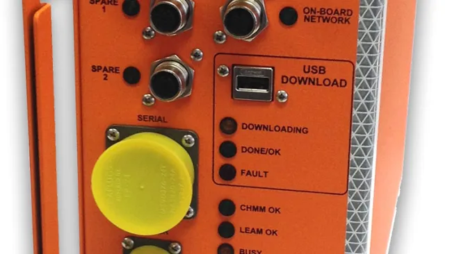 Orange crash hardened memory module with multiple ports, indicator lights, and USB download slot