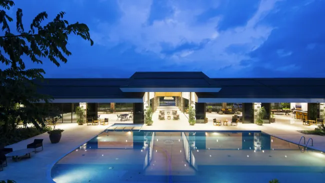 a swimming pool outside of a building