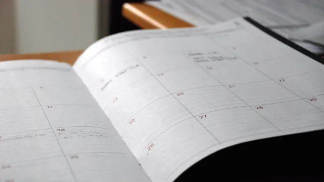 a notebook with a spiral bound page