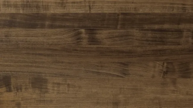Smooth dark brown wooden surface with natural grain and subtle texture patterns