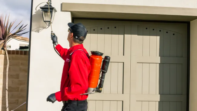 a man holding a fire extinguisher