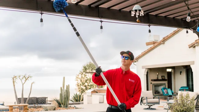 a man holding a fishing pole
