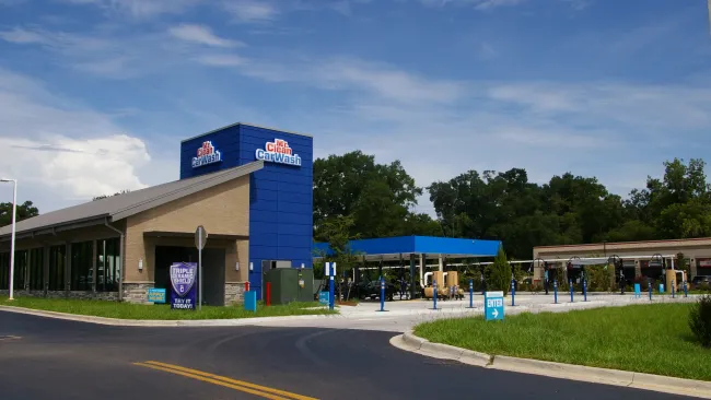 a building with a blue awning