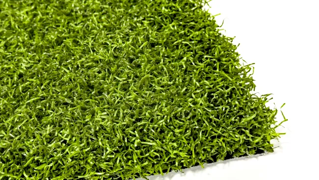 Close-up of vibrant green synthetic grass showing texture and quality.