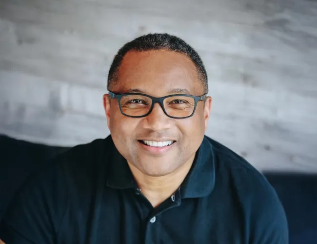 John Goodwin wearing glasses