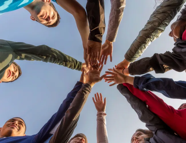 a group of people in a circle