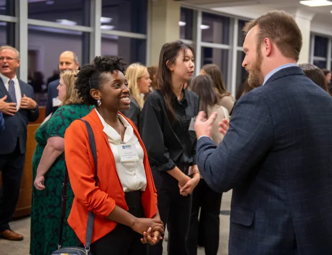a man and woman shaking hands