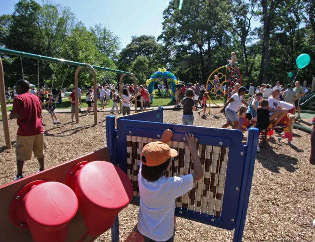 a group of people at a playground