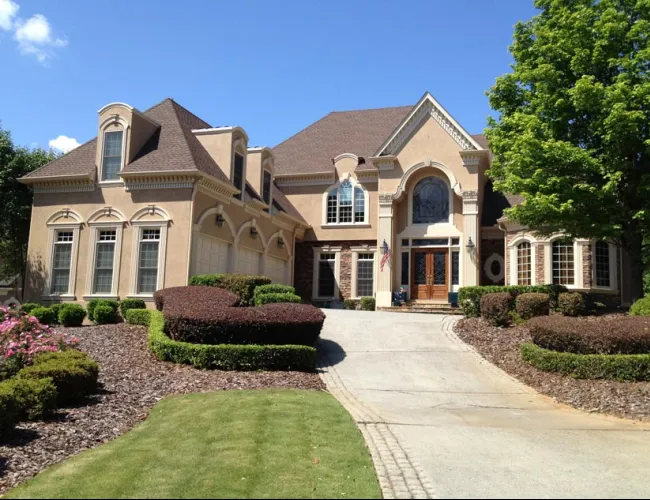 a large house with a front yard
