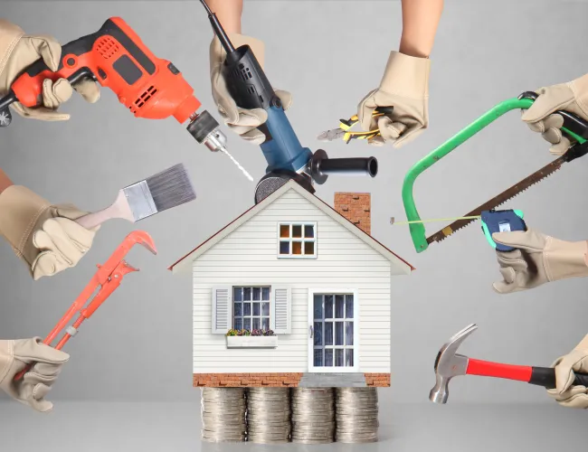 a group of people working on a house