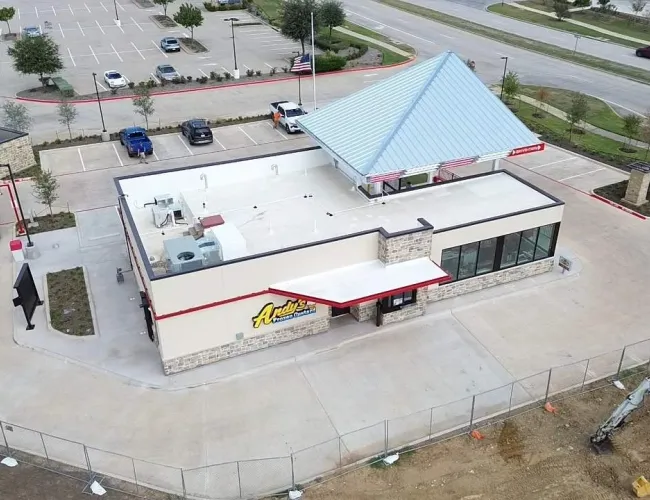 a building with a parking lot