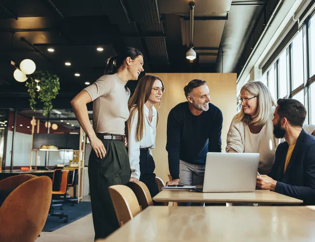 a group of people in a meeting