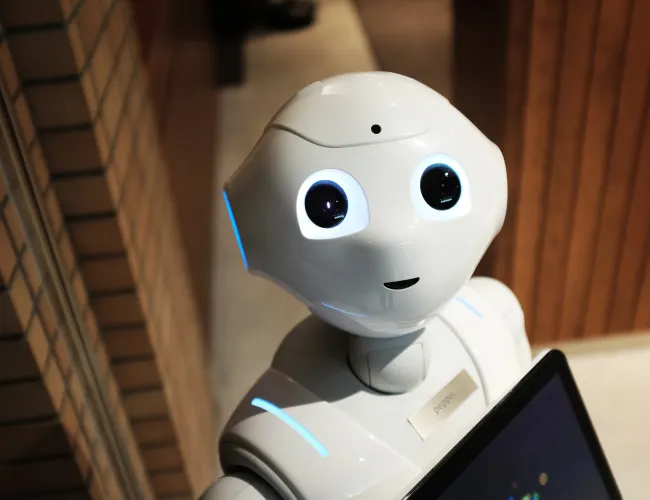 a white robot on a table