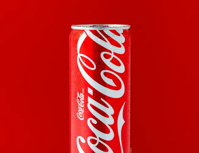 a red and white can of soda