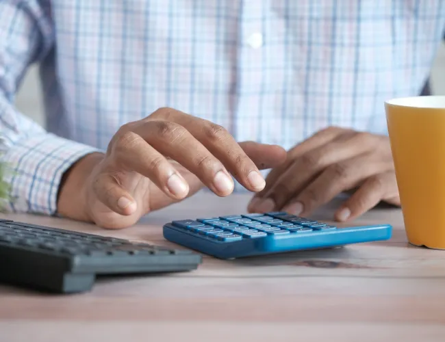 a person typing on a keyboard