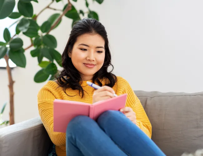 a woman sitting on a couch