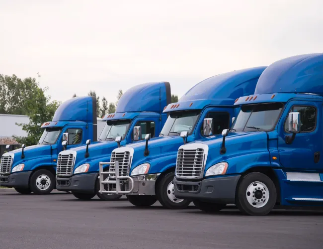 a group of blue trucks