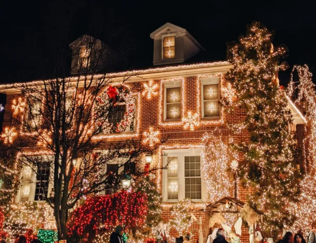 a large brick building with christmas lights