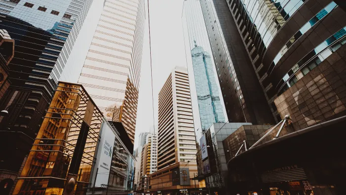 a city street with tall buildings
