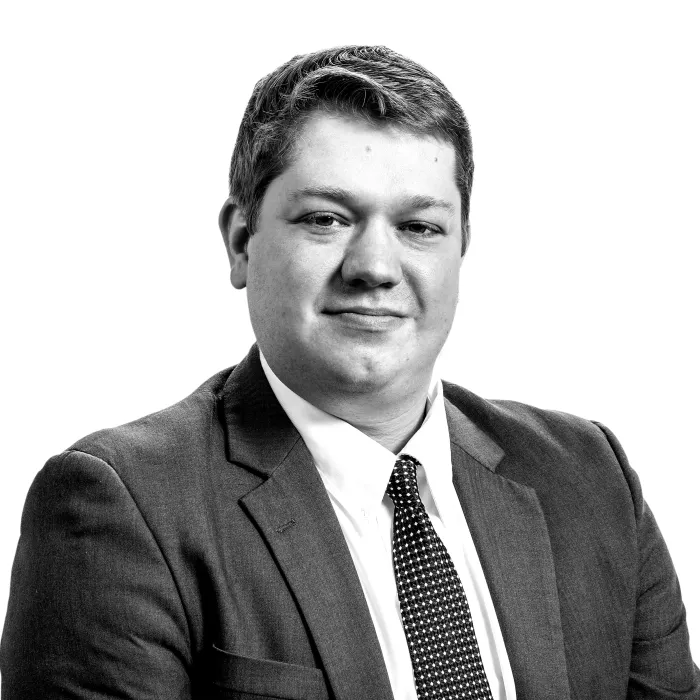 a man wearing a suit and tie