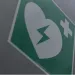 a green and white sign