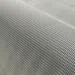 Close-up of a fine metal mesh fabric showcasing a woven grid pattern with a silver-gray finish.