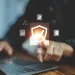 a person holding a laptop
