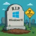 Gravestone with Windows 10 logo and R.I.P. text beside a yellow sign stating end of support on Oct 14.