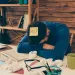 a person sleeping on a desk