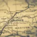 Close-up of a vintage map highlighting Rexburg, Idaho and surrounding towns and highways.