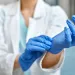 a medical professional wearing gloves