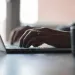 HIPAA Compliance Consultant working on a computer