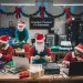 a group of men wearing santa hats