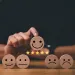 a hand holding a group of dice