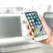 a hand holding a phone