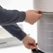 a person holding a file